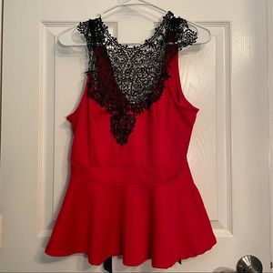 Beautiful black and red top with lots of detail.